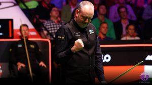 Mark Williams secures final spot with victory over Judd Trump 