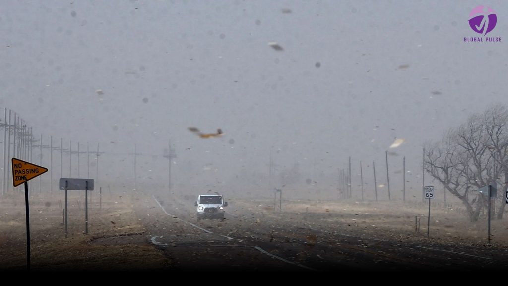 Hurricane-force winds cause damage and knock out electricity across the Midwest and Plains regions